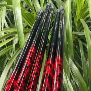 Đối trọng kim loại chắc chắn và họa tiết vân rồng ở gốc cần câu đài LK Tổng Hợp