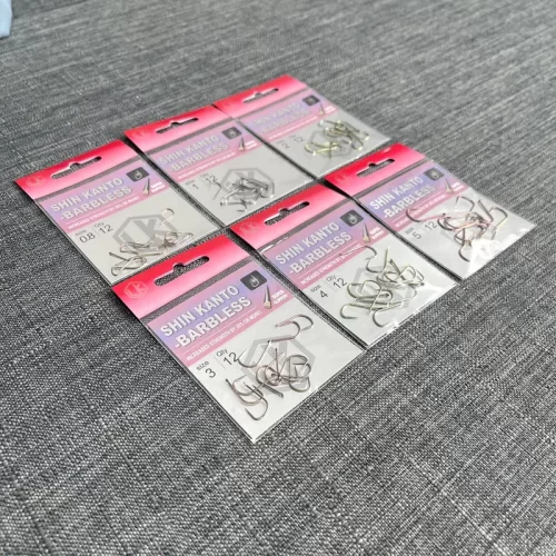 Lưỡi rô chép LK các gói phụ kiện câu đài cao cấp xếp thành hai hàng trên nền xám